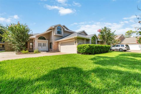 Photo of 13103 Wickersham Lane, Houston, TX 77077 (MLS # 39790613)