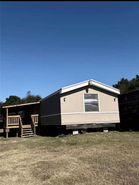 Tiny photo for 1217 County Road 3404, Cleveland, TX 77327 (MLS # 57813758)