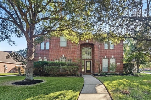 Photo of 9702 Caritas Circle, Houston, TX 77065 (MLS # 68641833)