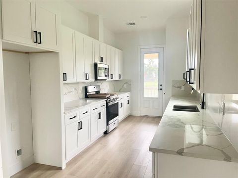 Photo of 11735 Fleming Drive, Houston, TX 77013 (MLS # 68686547)