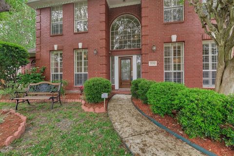 Photo of 14103 Heatherhill Place, Houston, TX 77077 (MLS # 95569620)