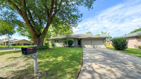 Photo of 6230 Knollwest Drive, Houston, TX 77072 (MLS # 63178667)