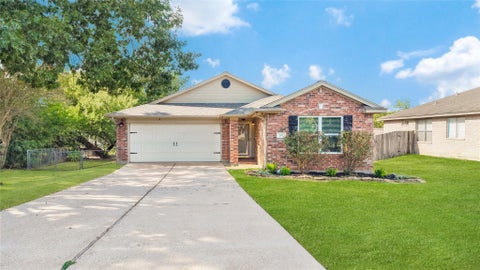 Photo of 207 Leisure Lane, Montgomery, TX 77356 (MLS # 27826139)