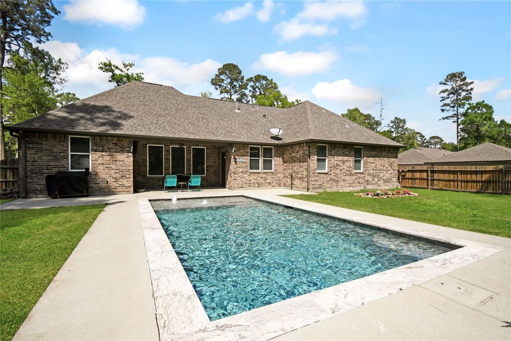 Photo of 2406 Hummingbird Street, New Caney, TX 77357 (MLS # 28460859)