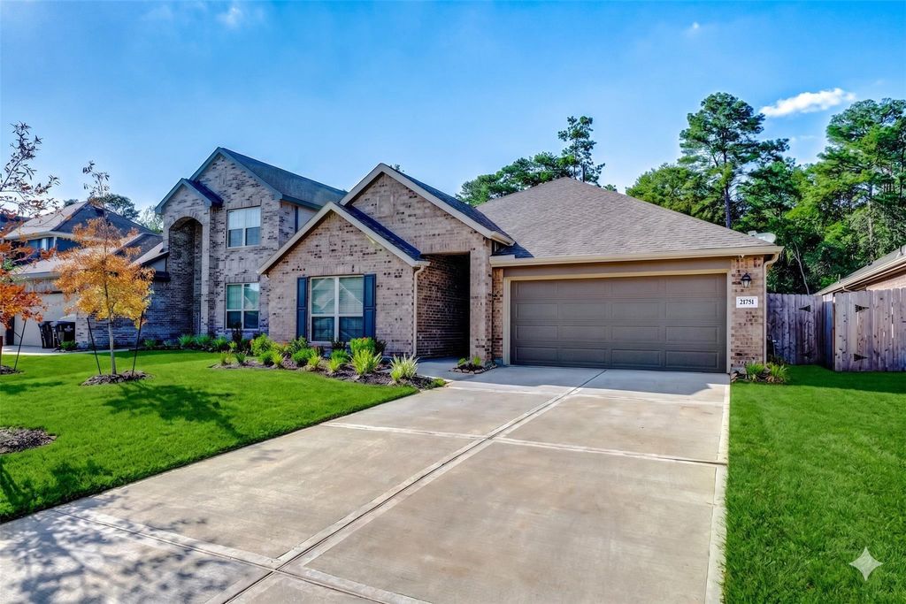 Photo of 21751 Thicket Point Lane, New Caney, TX 77357 (MLS # 84850084)