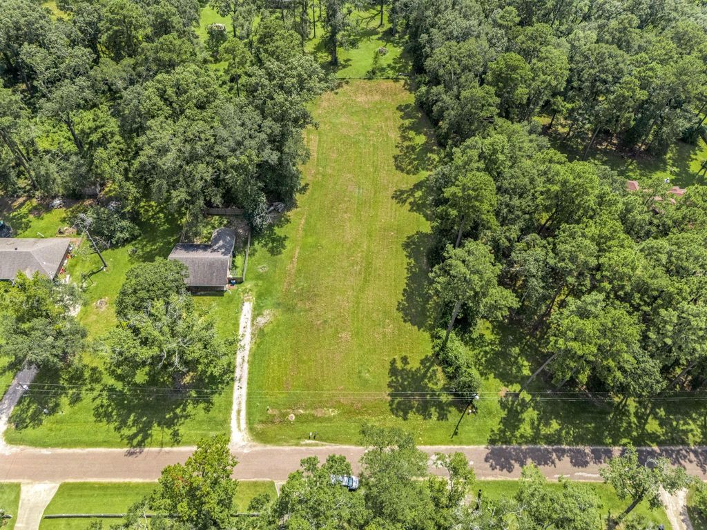 Photo of 55 Woodbranch Dr B Dr, New Caney, TX 77357 (MLS # 6117817)