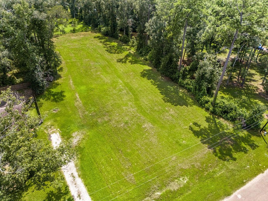 Photo of 55 Woodbranch Dr B Dr, New Caney, TX 77357 (MLS # 6117817)