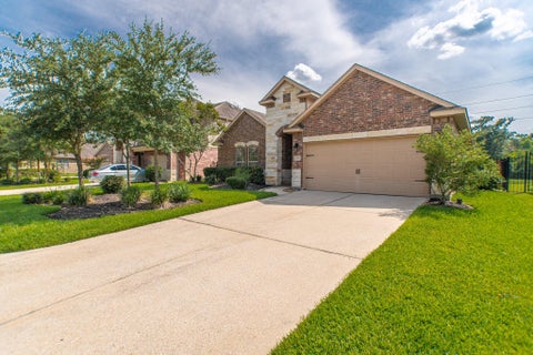 Photo of 99 W Wading Pond Circle, The Woodlands, TX 77375 (MLS # 27187978)