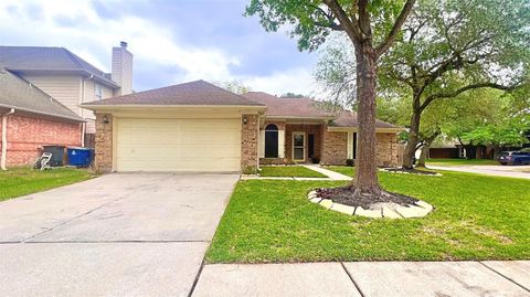 Photo of 19610 Vernier Woods Lane, Spring, TX 77379 (MLS # 23698923)