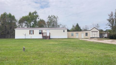 Photo of 70 County Road 3479h, Cleveland, TX 77327 (MLS # 26965958)