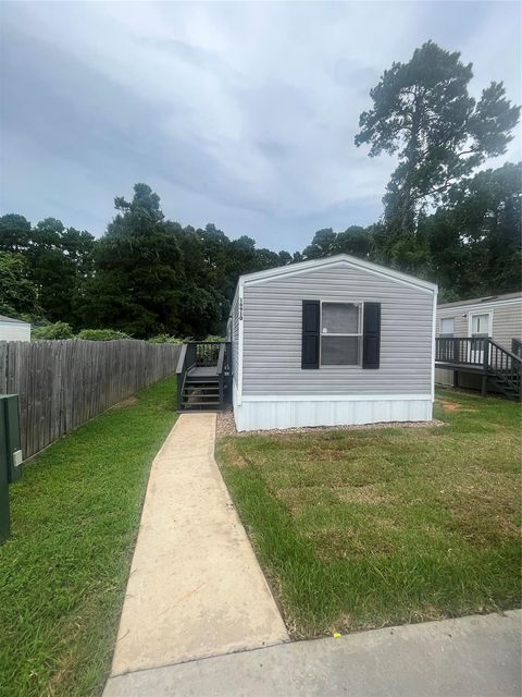 Photo of 16906 Balmoral, Montgomery, TX 77316 (MLS # 82976143)
