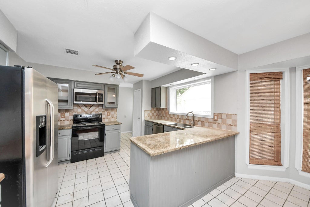Photo of 4330 Meadow Springs Drive, Houston, TX 77339 (MLS # 32702277)
