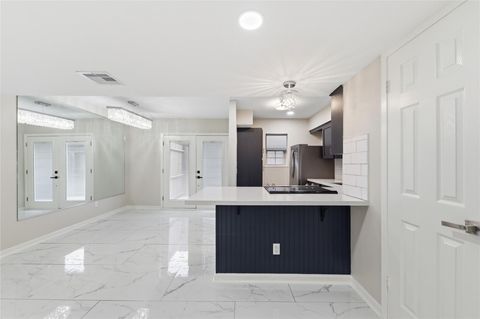 Photo of 515 Tallowood Road #15, Houston, TX 77024 (MLS # 22627867)