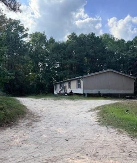 Photo of 1705 Spring Ridge Road, Coldspring, TX 77331 (MLS # 48714875) Photo of 1705 Spring Ridge Road, Coldspring, TX 77331 (MLS # 48714875)