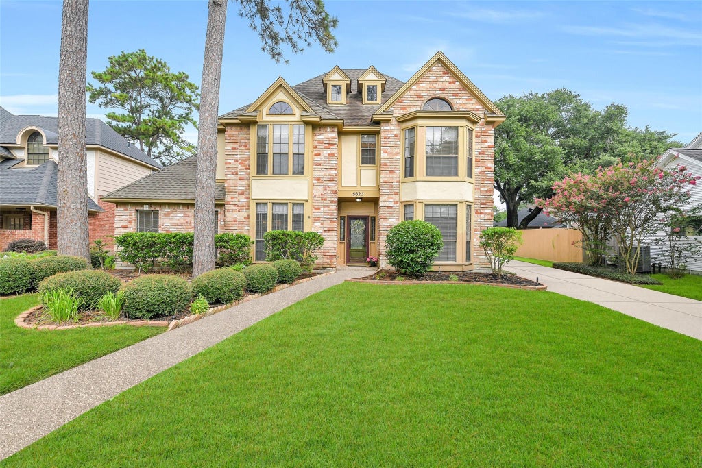 Photo of 5623 Spring Lodge Drive, Kingwood, TX 77345 (MLS # 36115325)