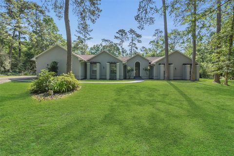 Photo of 44 Lake Forest Circle, Conroe, TX 77384 (MLS # 70195964)