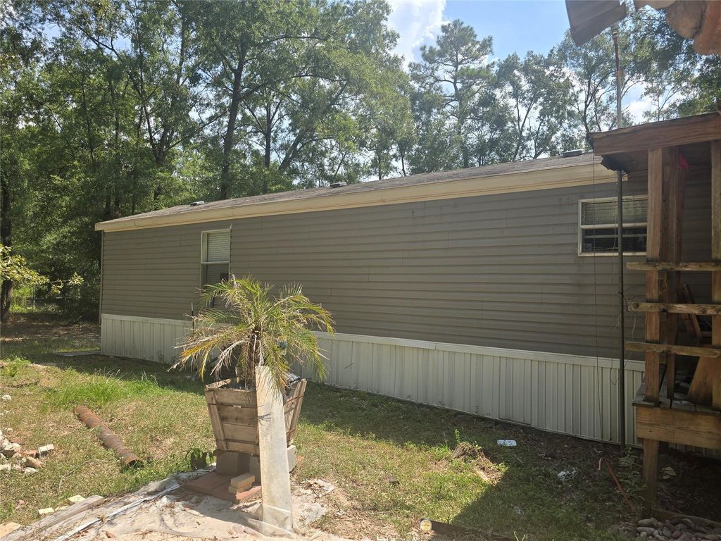 Photo of 22877 Hughey Lane, New Caney, TX 77357 (MLS # 53238673)