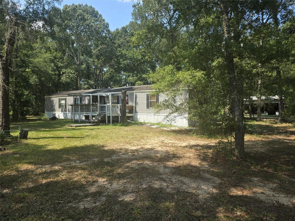 Photo of 22877 Hughey Lane, New Caney, TX 77357 (MLS # 53238673)
