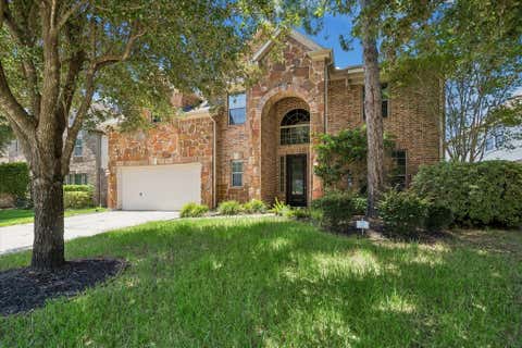 Photo of 13915 Sawmill Run Lane, Houston, TX 77044 (MLS # 74914843)