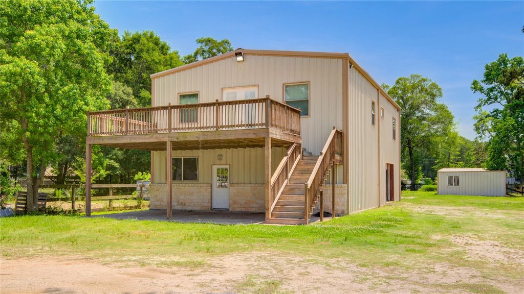 Photo of 16947 Pioneer Trail, Conroe, TX 77302 (MLS # 69704047)