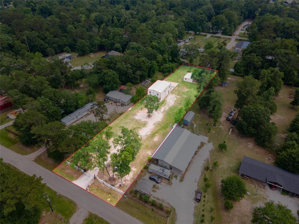 Photo of 16947 Pioneer Trail, Conroe, TX 77302 (MLS # 69704047)