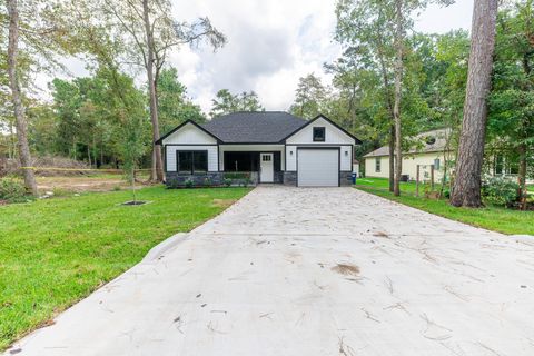 Photo of 3507 Sam Houston Road Rd, Willis, TX 77378 (MLS # 83319477)