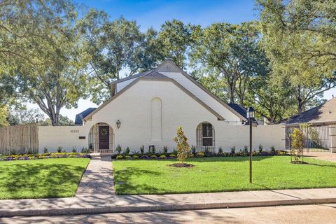 Photo of 10203 Meadow Lake Lane, Houston, TX 77042 (MLS # 49971123)