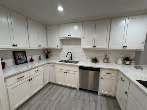 Photo of 7703 Moonmist DR #B, Houston, TX 77036 (MLS # 59733395)