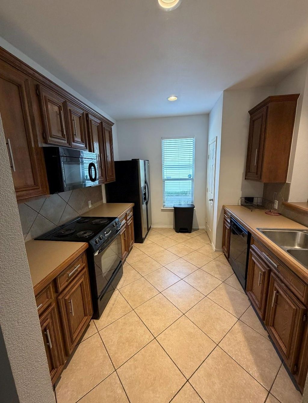 Photo of 4514 Plum Creek Forest Lane, Houston, TX 77087 (MLS # 22210035)