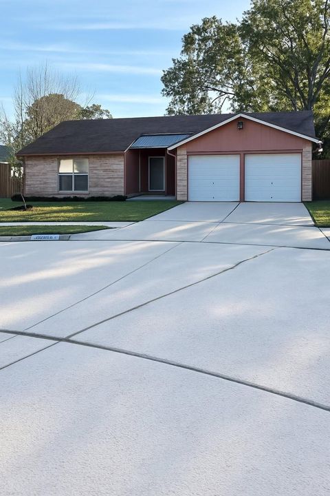 Photo of 8302 Opalwood Lane, Humble, TX 77338 (MLS # 67748045)