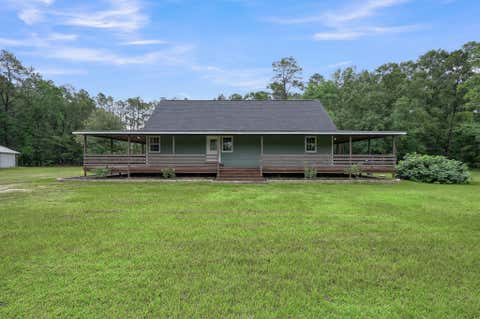 Photo of 1810 S Farm To Market 1486 Road, Montgomery, TX 77316 (MLS # 64517776)