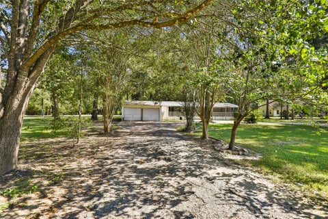Photo of 750 County Road 6471, Dayton, TX 77535 (MLS # 23950985)