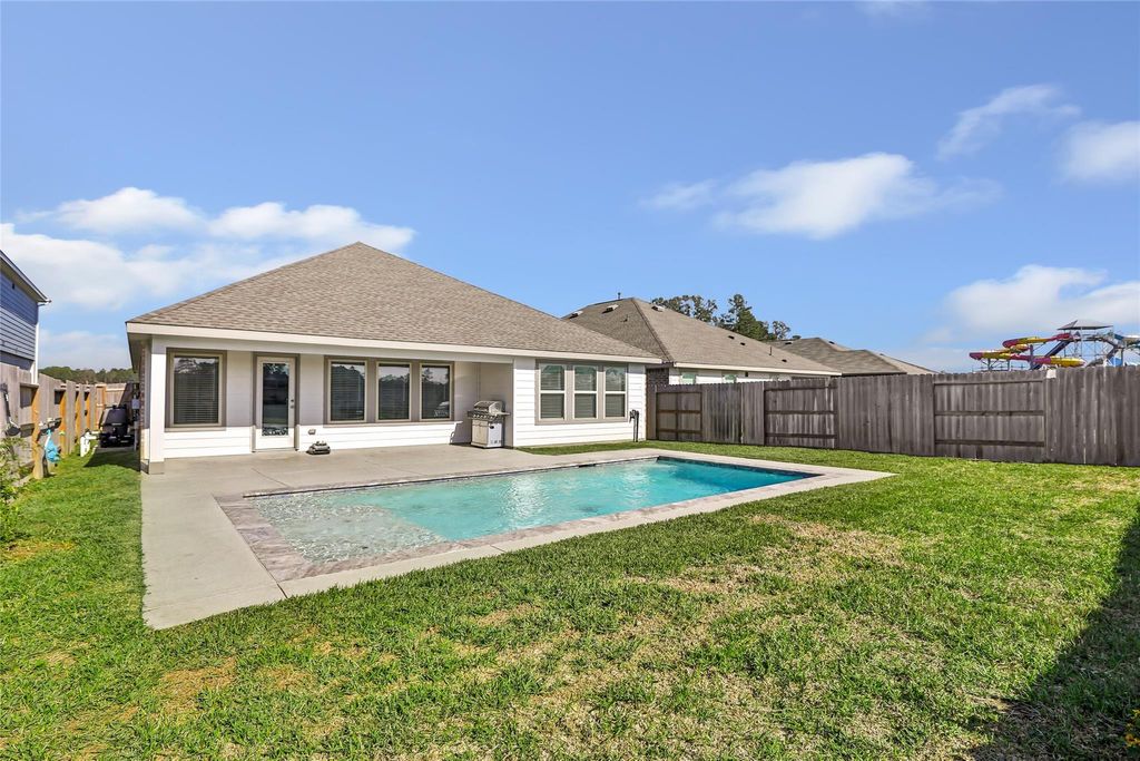 Photo of 22464 Mountain Pine Drive, New Caney, TX 77357 (MLS # 21952404)