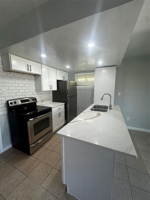 Photo of 8110 Albacore Drive #30, Houston, TX 77074 (MLS # 21176802)