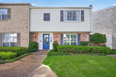 Photo of 12618 Huntingwick Drive #100, Houston, TX 77024 (MLS # 87181280)