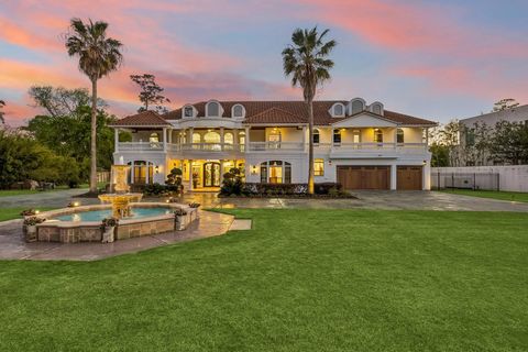 Photo of 9105 Memorial Drive, Houston, TX 77024 (MLS # 61669462)