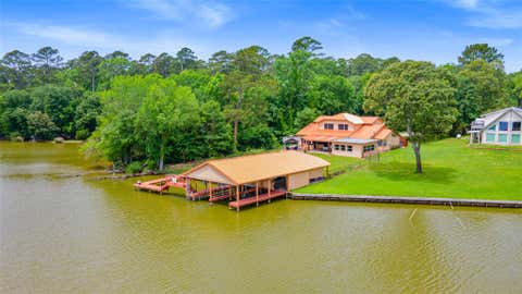 Photo of 56 Magnolia Drive, Huntsville, TX 77340 (MLS # 74176997)
