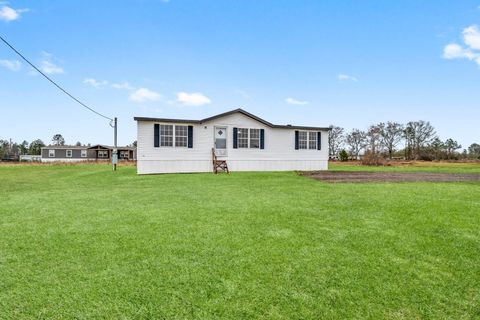 Photo of 849 Road 5027, Cleveland, TX 77327 (MLS # 70379087)