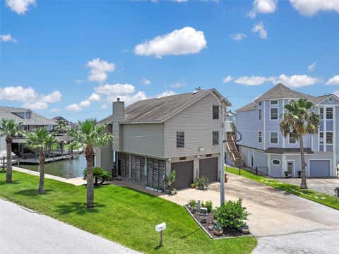 Photo of 214 Easterly Drive, Tiki Island, TX 77554 (MLS # 96769174)