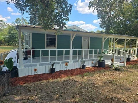 Photo of 590 County Road 2131, Cleveland, TX 77327 (MLS # 90694560)