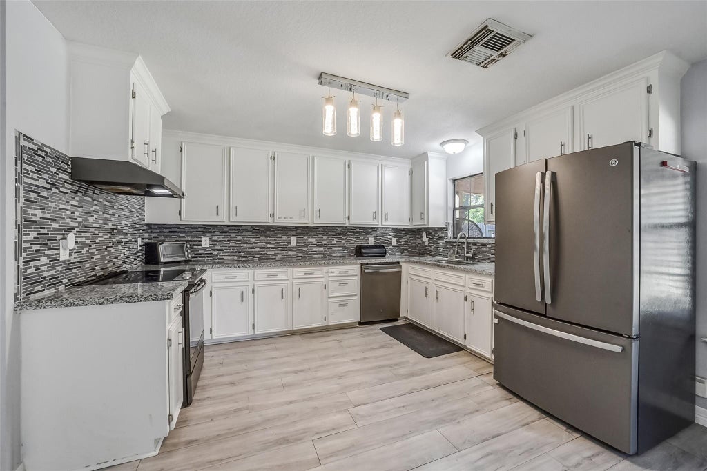 Photo of 22911 Keith Drive, New Caney, TX 77357 (MLS # 39425852)