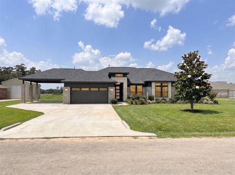 Photo of 11212 Bulldog Lane, Conroe, TX 77306 (MLS # 22330611)
