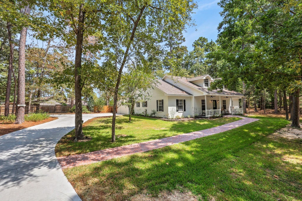 Photo of 221 Lake Grove Drive, Coldspring, TX 77331 (MLS # 80548526)