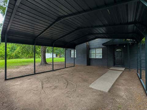 Photo of 435 County Road 3310, Cleveland, TX 77327 (MLS # 65853294)
