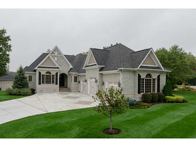 Exterior Front. This is a unique custom ranch home on the water at Geist