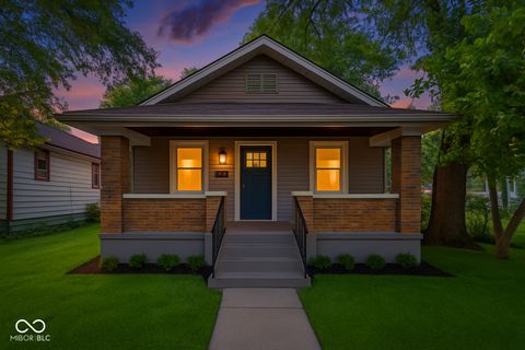 Photo of 1110 N Tibbs Avenue, Indianapolis, IN 46222 (MLS # 22050717)