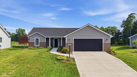 Photo of 1910 Portland Cove, Huntertown, IN 46748 (MLS # 22115122)
