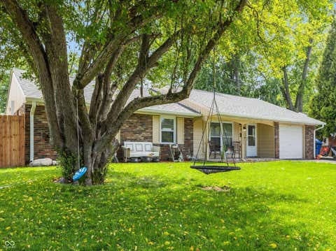 Photo of 921 W Stop 11 Road, Indianapolis, IN 46217 (MLS # 22104865)