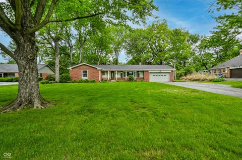 Photo of 1014 W 77th Street South Drive, Indianapolis, IN 46260 (MLS # 22099456)