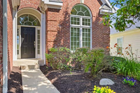 Photo of 9012 Crystal Lake Drive, Indianapolis, IN 46240 (MLS # 22113977)